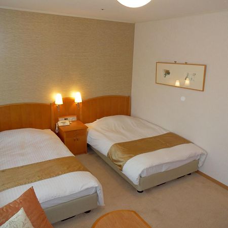 Kobe Luminous Hotel Quarto foto