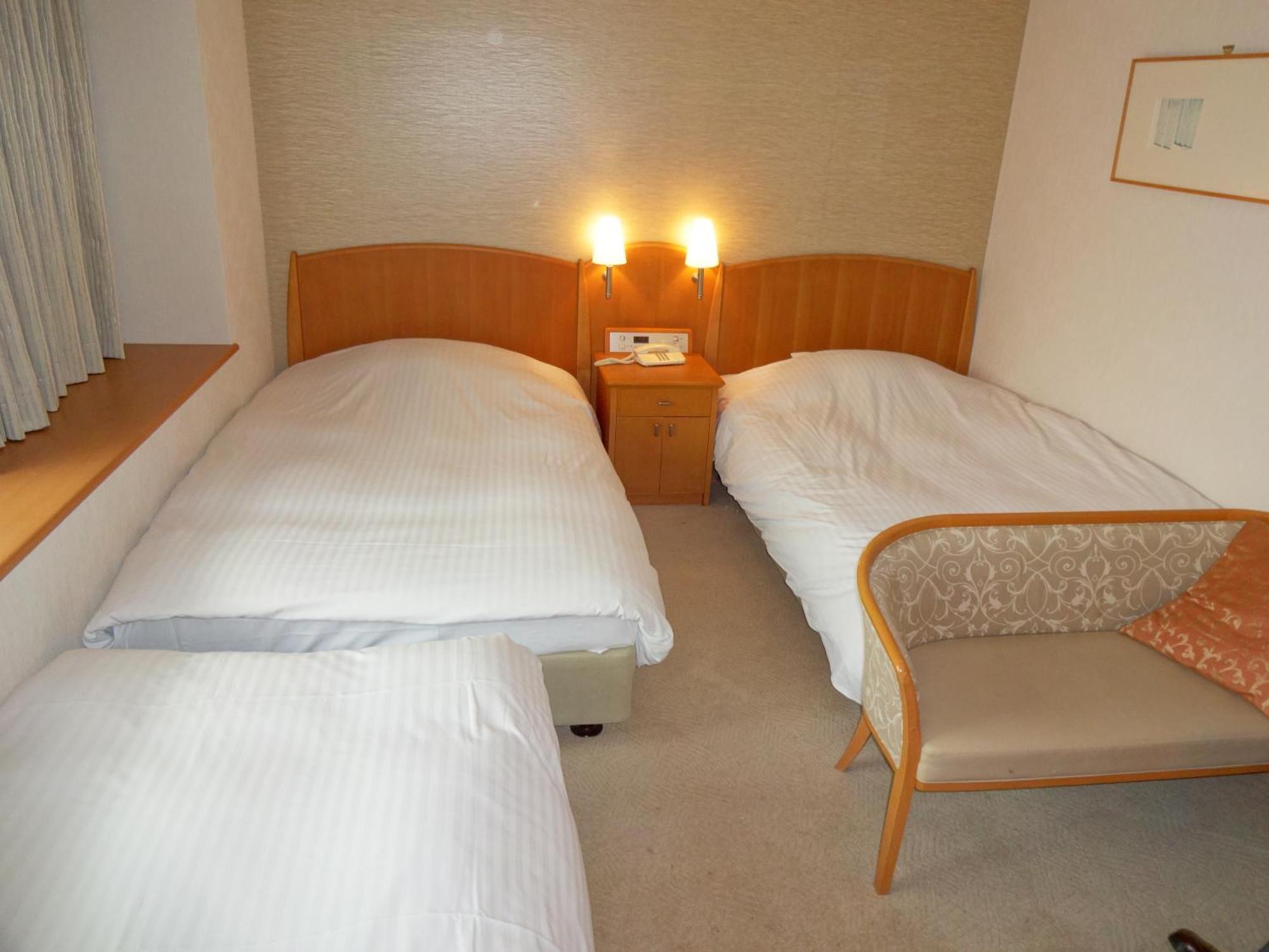 Kobe Luminous Hotel Quarto foto